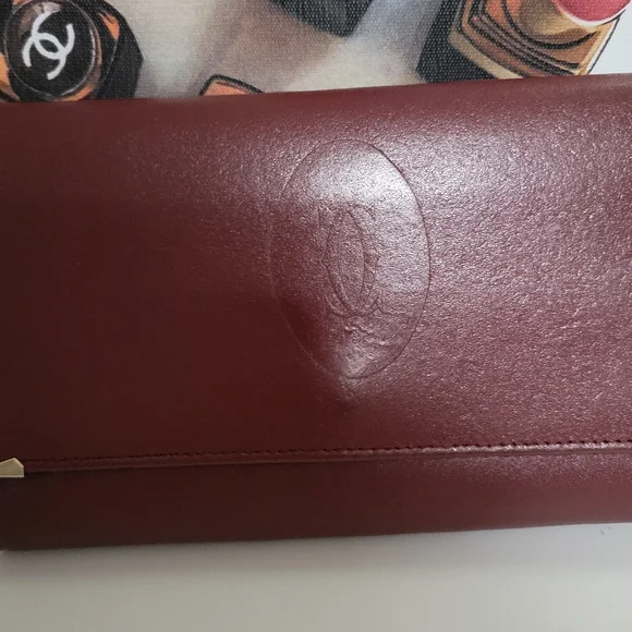 Cartier signature wallet with inside kiss lock and zipper pocket. EUC - Picture 2 of 13